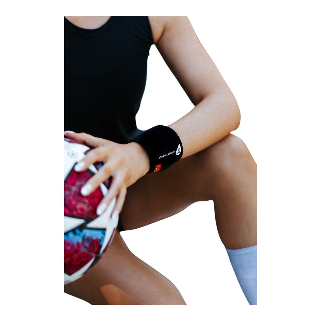 Athlete wearing Impact Band over her smartwatch